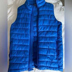 Gender neutral Old Navy royal blue puffy vest.